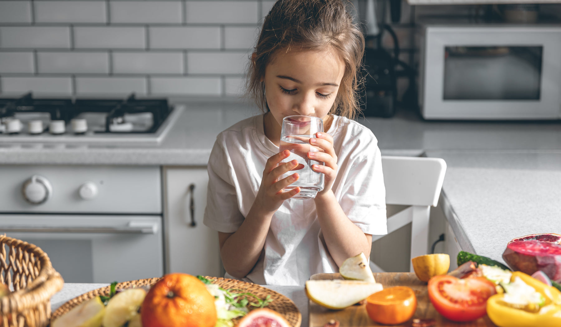  little girl drinking clean filtered water back to school hydration 