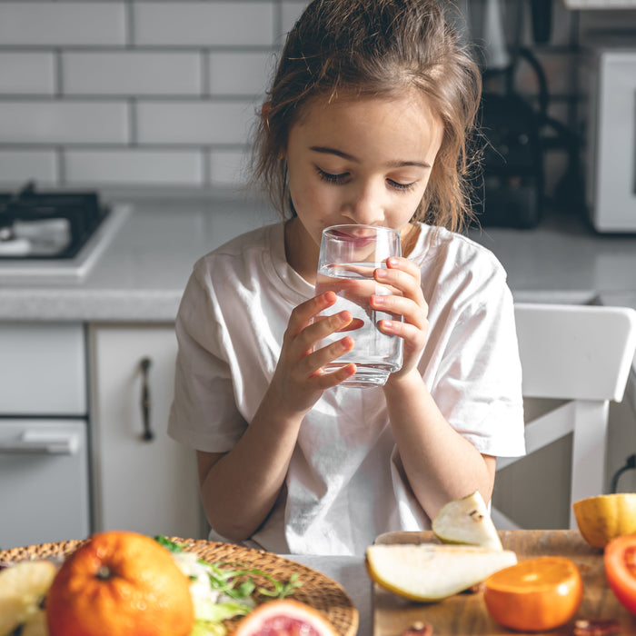  little girl drinking clean filtered water back to school hydration 