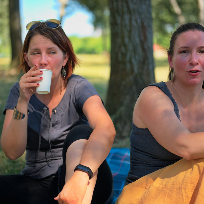  women drinking filtered water outdoor summer hydration 